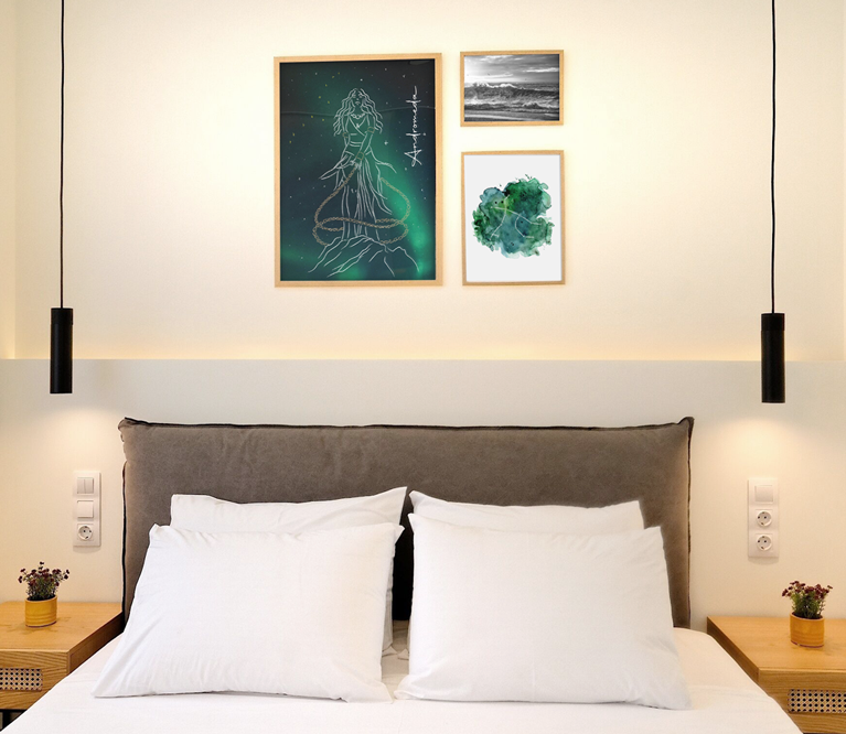 Wall art illustrations and graphics of Andromeda that decorate the bedroom of a themed hotel. By The Blank Sheep